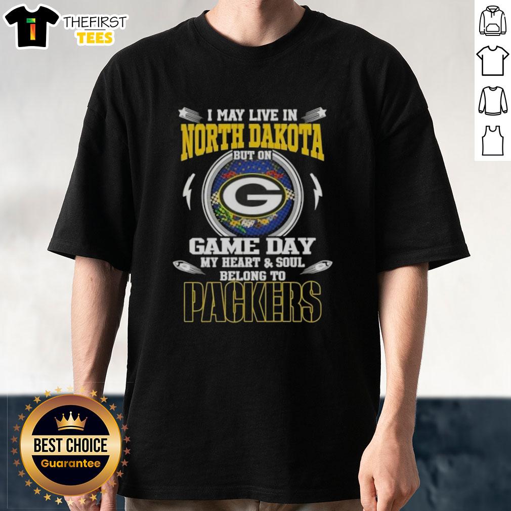 premium-i-may-live-in-north-dakota-but-on-game-day-my-heart-and-soul-belongs-to-green-bay-packers-t-shirt Alt Text: Premium I May Live In North Dakota But On Game Day My Heart And Soul Belongs To Green Bay Packers T-Shirt design.