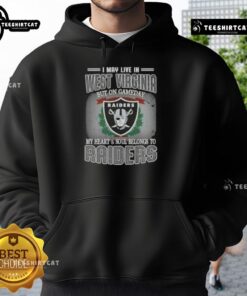 Premium hoodie featuring 'I May Live In West Virginia But On Gameday My Heart And Soul Belongs To Raiders' design.