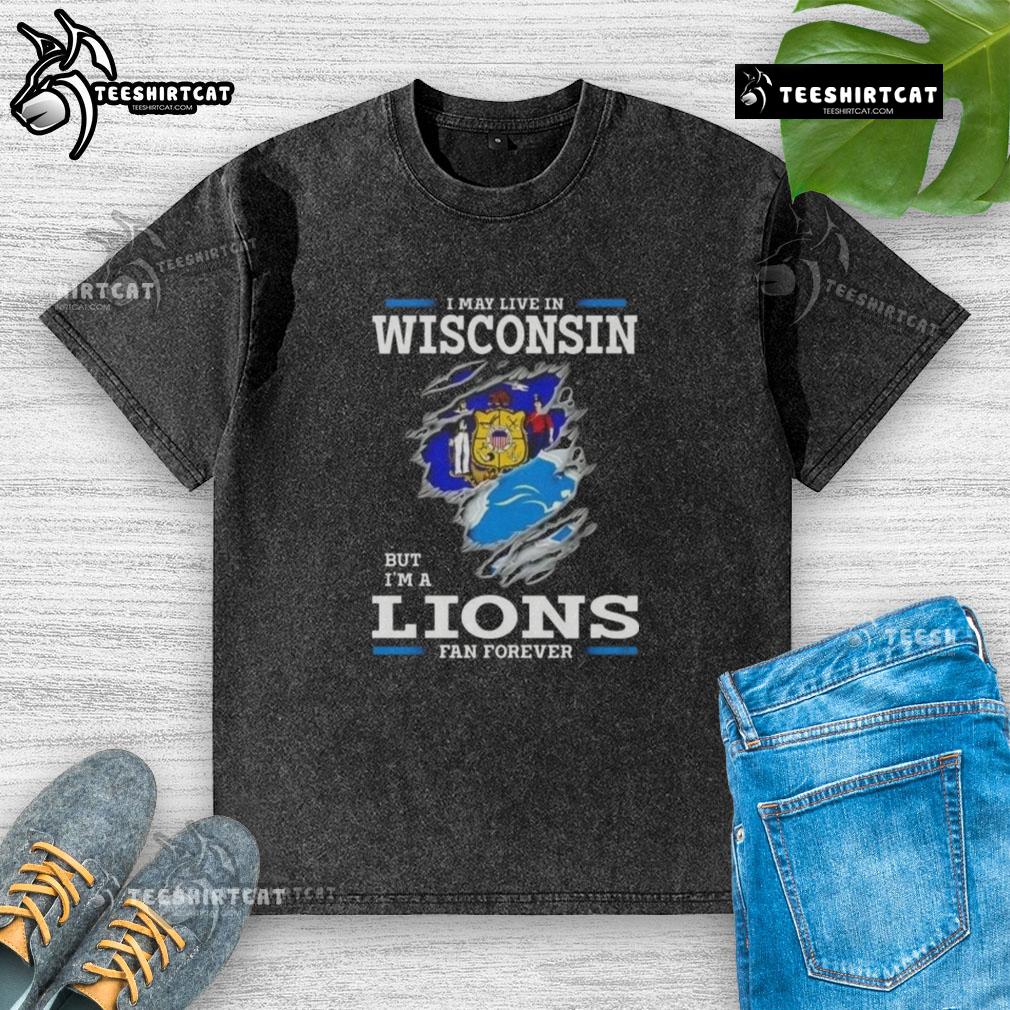 Premium I May Live In Wisconsin But I'M A Lions Fan Forever Washed T Shirt Premium washed t-shirt featuring 'I May Live In Wisconsin But I'm A Lions Fan Forever' design for loyal fans.