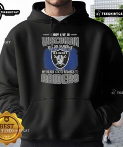Premium hoodie with 'I May Live In Wisconsin But On Gameday My Heart And Soul Belongs To Raiders' design.