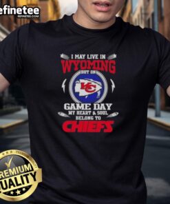 Alt Text: Premium Kansas City Chiefs T-shirt featuring I May Live In Wyoming But On Game Day My Heart Belongs To KC design.