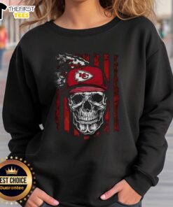 Premium Kansas City Chiefs NFL sweatshirt featuring a skull design with American flag for football lovers.