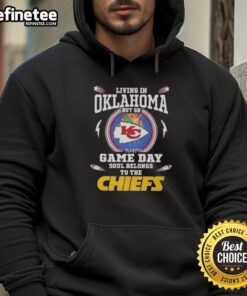 Alt Text: Premium living in Oklahoma hoodie for Kansas City Chiefs fans on game day, showcasing team pride and comfort.