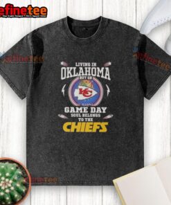 Premium living in Oklahoma with a Kansas City Chiefs washed t-shirt, perfect for game day fans showing team spirit.