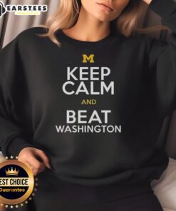 Alt Text: Premium Michigan Wolverines Keep Calm and Beat Washington sweatshirt in navy blue, perfect for game day attire.