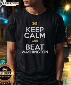 Premium Michigan Wolverines 'Keep Calm And Beat Washington' T-Shirt featuring bold graphics and team colors.