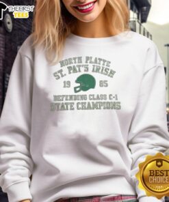 Premium North Platte St. Pats Irish Defending Class C-1 State Champions Sweatshirt in vibrant green for fans.