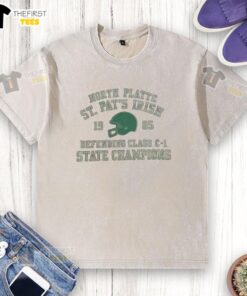 Premium North Platte St. Pat's Irish Defending Class C-1 State Champions washed t-shirt displayed on a hanger.