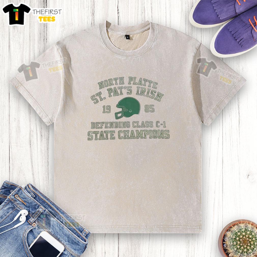 premium-north-platte-st-pats-irish-defending-class-c-1-state-champions-washed-t-shirt Premium North Platte St. Pat's Irish Defending Class C-1 State Champions washed t-shirt displayed on a hanger.