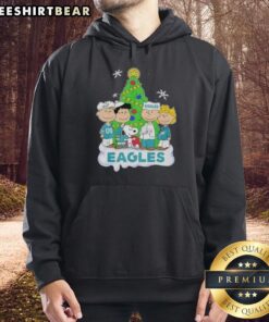 Premium Peanuts characters on a Philadelphia Eagles Christmas hoodie, perfect for holiday fans and cozy game days.