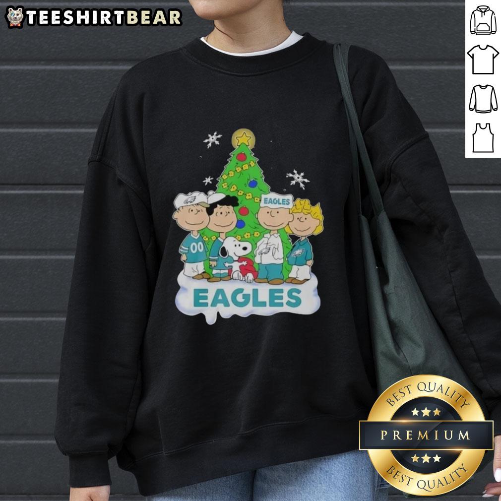 Premium Peanuts Characters X Philadelphia Eagles Chrismas Sweatshirt Premium Peanuts Characters X Philadelphia Eagles Christmas Sweatshirt featuring festive designs and team spirit.