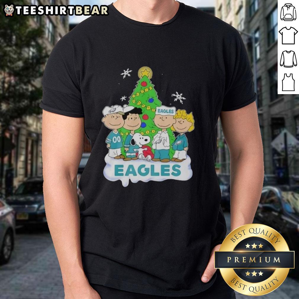 Premium Peanuts Characters X Philadelphia Eagles Chrismas T Shirt Premium Peanuts Characters X Philadelphia Eagles Christmas T-Shirt featuring festive designs for fans and holiday cheer.