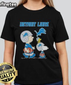 Premium Peanuts Snoopy and Charlie Brown Detroit Lions football ladies tee in vibrant colors, perfect for fans.