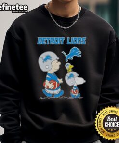 Premium Peanuts Snoopy and Charlie Brown X Detroit Lions football sweatshirt featuring vibrant graphics and cozy design.