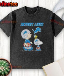Premium Peanuts Snoopy and Charlie Brown X Detroit Lions football washed t-shirt featuring iconic characters and team logo.