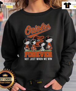 Premium Peanuts X Baltimore Orioles sweatshirt featuring 'Forever, Not Just When We Win' slogan in vibrant colors.