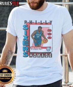 Alt Text: Premium Philadelphia 76ers trading card featuring Joel Embiid on a stylish t-shirt for basketball fans.