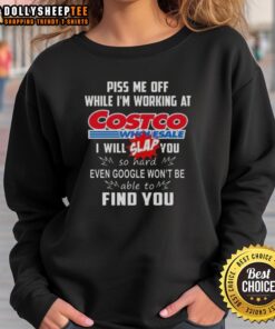 Premium 'Piss Me Off While I'm Working at Costco' sweatshirt, featuring bold text and a stylish design for humor lovers.