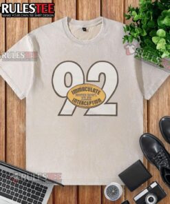 Premium Pittsburgh Steelers Immaculate Interception Harrison washed t-shirt featuring bold team graphics and soft fabric.