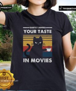 Premium Ladies Tee featuring 'Quietly Judges Your Taste in Movies' design, perfect for movie lovers and casual wear.