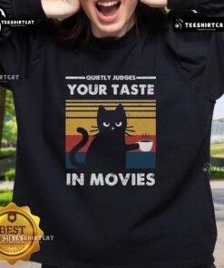 Premium Quietly Judges Your Taste in Movies Sweatshirt in a stylish design, perfect for movie lovers and cozy nights in.