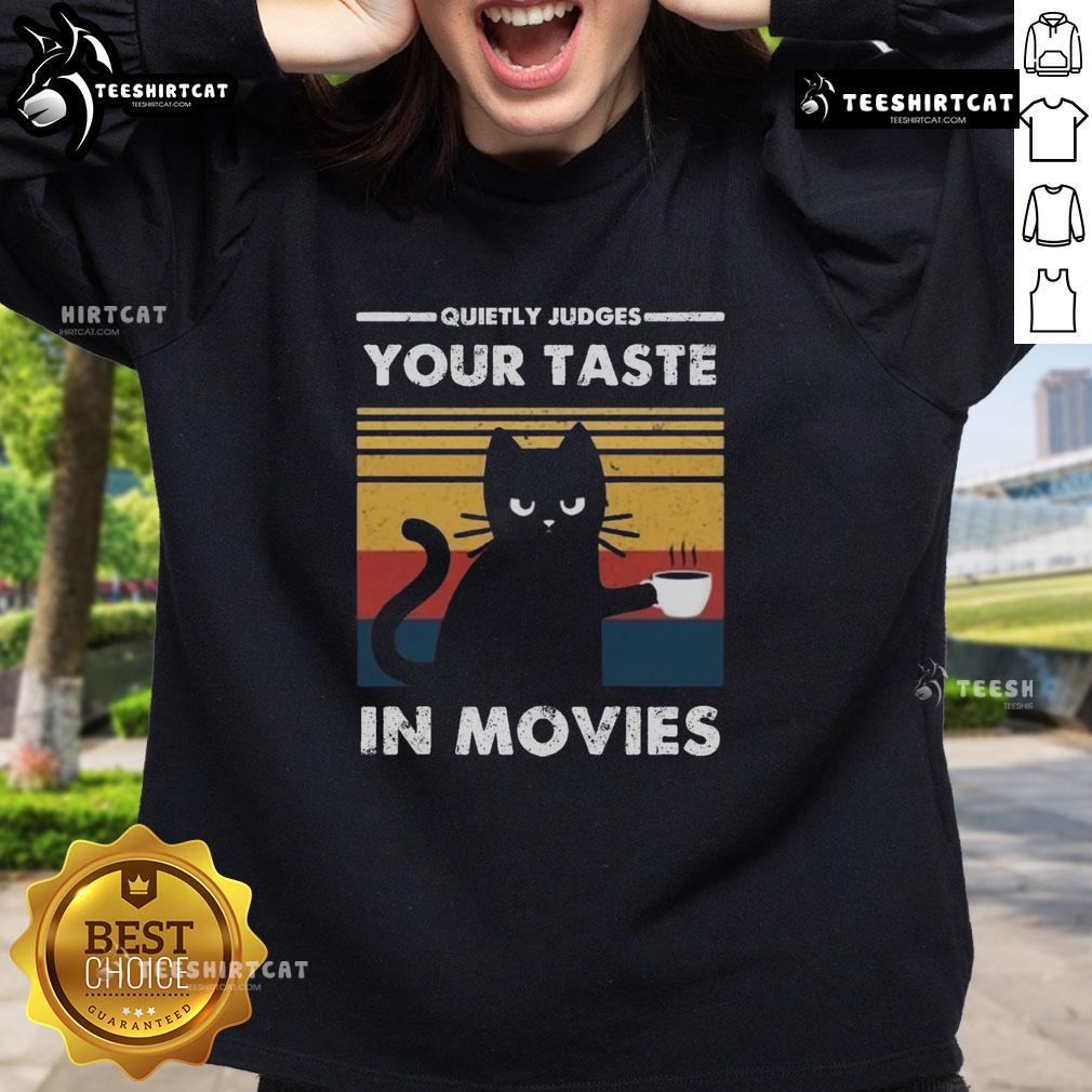 Premium Quietly Judges Your Taste In Movies Sweatshirt Premium Quietly Judges Your Taste in Movies Sweatshirt in a stylish design, perfect for movie lovers and cozy nights in.