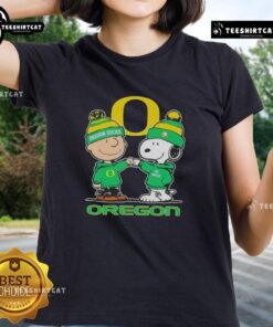 Alt Text: Premium Snoopy and Charlie Brown Oregon Ducks Football Skyline Ladies Tee featuring vibrant graphics and comfortable fit.