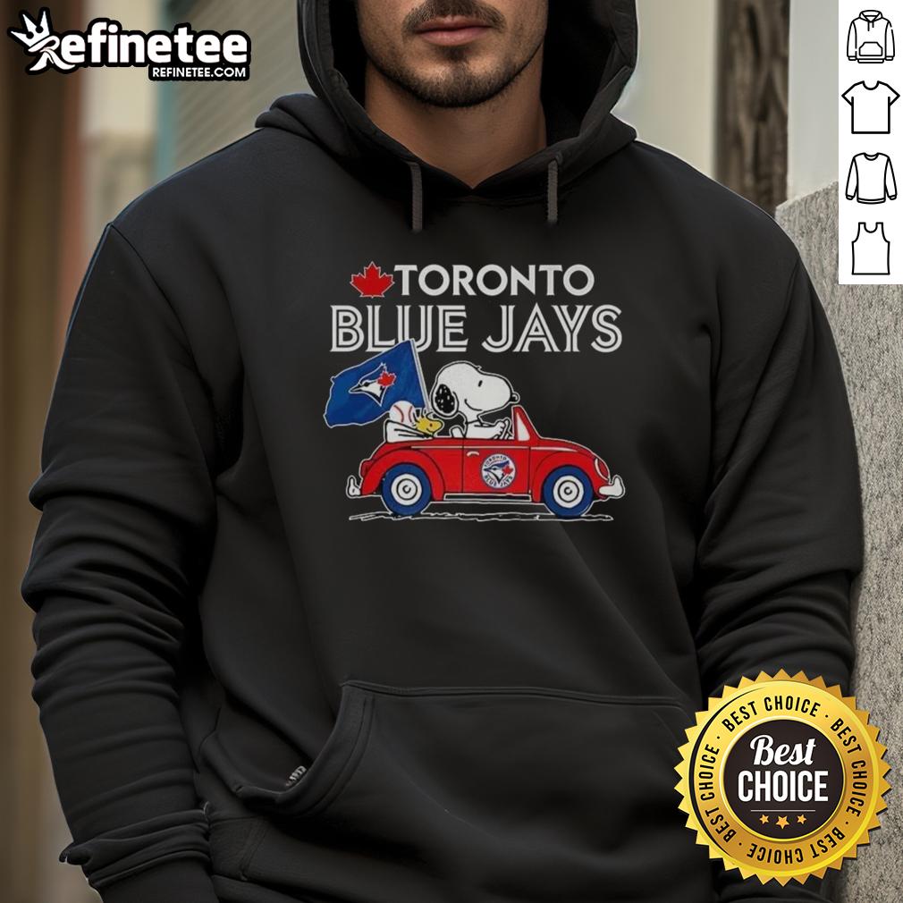 premium-snoopy-and-woodstock-on-volkswagen-beetle-x-toronto-blue-jays-baseball-fans-hoodie Alt Text: Premium Snoopy and Woodstock on Volkswagen Beetle hoodie for Toronto Blue Jays baseball fans, stylish and fun.