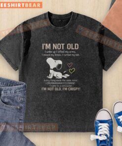 Alt Text: Premium Snoopy I'm Not Old, I'm Crispy washed t-shirt featuring a fun graphic design and relaxed fit.