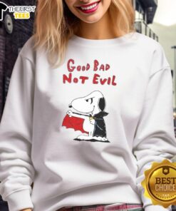 Alt Text: Premium Snoopy Vampire sweatshirt featuring a playful design with 'Good Bad Not Evil' text in vibrant colors.