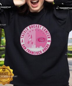 Premium tackle breast cancer sweatshirt featuring San Francisco 49ers logo and city skyline design.