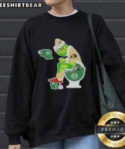 Premium The Grinch Colorado Buffaloes sweatshirt featuring a playful design of The Grinch on a toilet for Christmas.