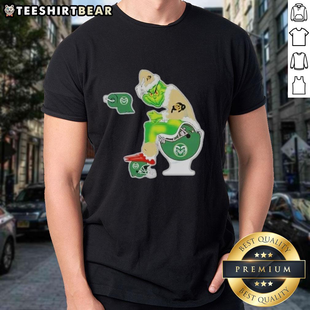 Premium The Grinch Colorado Buffaloes Sitting On Toilet Colorado State Rams Xmas Holiday Christmas T-Shirt Premium The Grinch Colorado Buffaloes Christmas T-Shirt featuring Grinch on toilet with Colorado State Rams design.