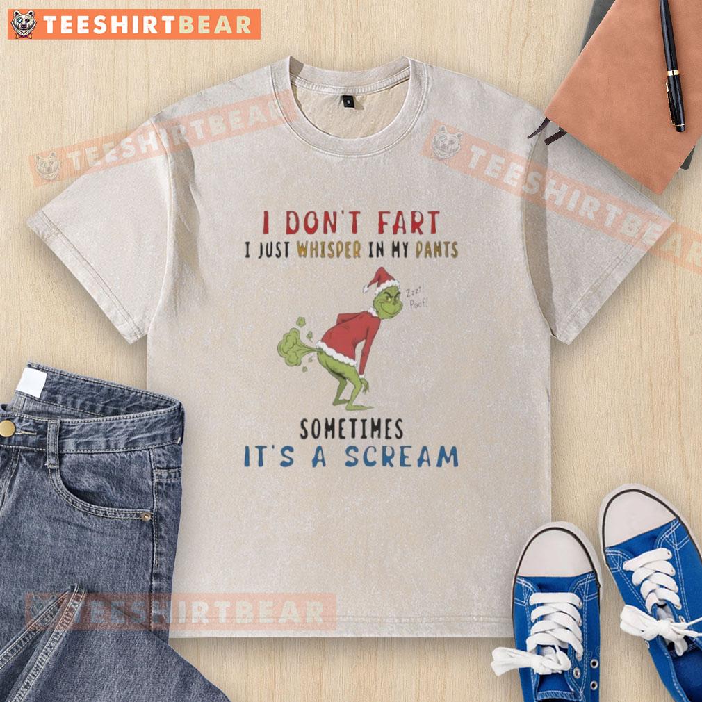 Premium The Grinch I Don't Fart I Just Whisper In My Pants Zzzt Poof Sometimes It's A Scream Washed T-Shirt Premium The Grinch 'I Don't Fart, I Just Whisper' T-Shirt in a casual setting, showcasing fun holiday humor.