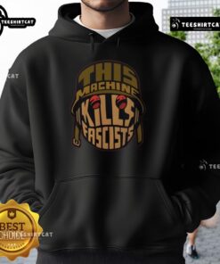 Alt Text: Premium hoodie featuring 'This Machine Kills Fascists' graphic, emphasizing guts over gasoline for a bold statement.