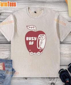 Premium top featuring a busy AF graphic on a washed apple T-shirt, perfect for casual and trendy outfits.