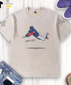 Alt Text: Premium Vladimir Guerrero Jr. Super Vlad Flying Slide Washed T-Shirt featuring vibrant graphics and a comfortable fit.