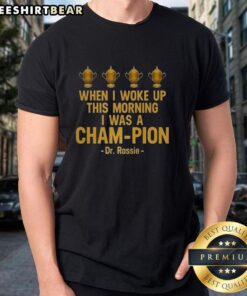 Alt Text: Premium When I Woke Up This Morning I Was A Cham-Pion Dr. Rassie T-Shirt featuring bold graphics and vibrant colors.