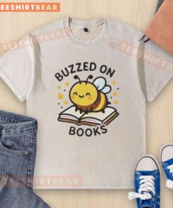 Pretty Bee Buzzed on Books washed t-shirt featuring a cute bee graphic and vibrant colors, perfect for book lovers.