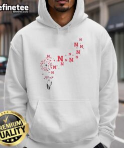 Pretty dandelion flower design on Nebraska Huskers football logo hoodie, perfect for fans and floral fashion enthusiasts.