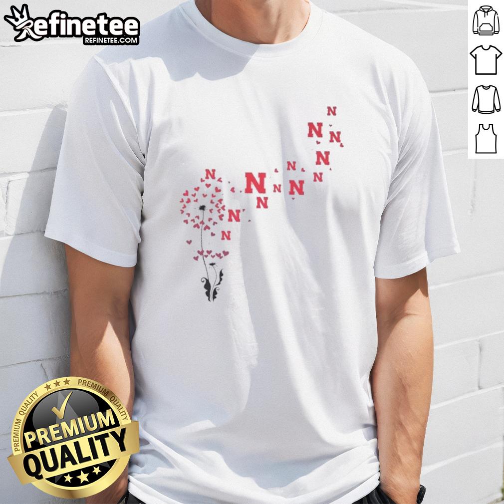 pretty-dandelion-flower-nebraska-huskers-football-logo-t-shirt Pretty dandelion flower design on Nebraska Huskers football logo T-shirt, perfect for fans and floral enthusiasts.