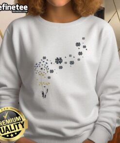 Alt Text: Pretty dandelion flower design on Notre Dame Fighting Irish football logo sweatshirt for stylish fans.