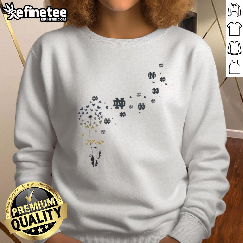 pretty-dandelion-flower-notre-dame-fighting-irish-football-logo-sweatshirt Alt Text: Pretty dandelion flower design on Notre Dame Fighting Irish football logo sweatshirt for stylish fans.