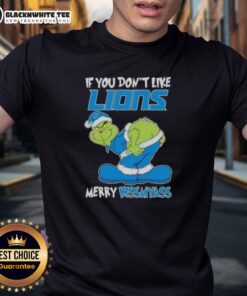 Pretty Grinch graphic on a 'Detroit Lions Merry Kissmyass' T-Shirt, perfect for holiday fans and Grinch lovers.