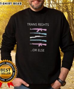 Stylish 'Pretty Guns Trans Rights or Else' LGBT sweatshirt featuring bold text and vibrant colors for proud supporters.