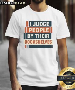 Alt Text: Pretty I Judge People By Their Bookshelves T-Shirt, featuring a stylish design for book lovers and literary enthusiasts.
