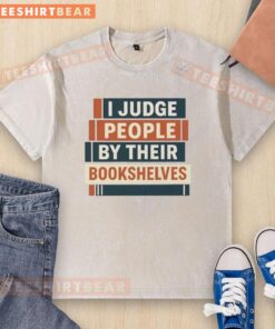 Pretty I Judge People By Their Bookshelves washed t-shirt showcasing a stylish design for book lovers and literary enthusiasts.
