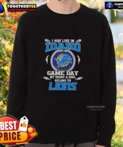 Cozy sweatshirt featuring 'Pretty I May Live in Idaho But on Game Day My Heart and Soul Belongs to Detroit Lions' design.
