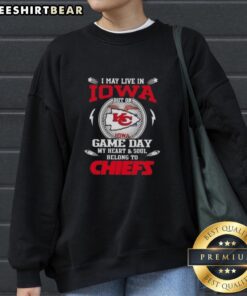 Alt Text: Cozy Kansas City Chiefs sweatshirt with Pretty I May Live In Iowa But On Game Day My Heart Belongs To Chiefs design.