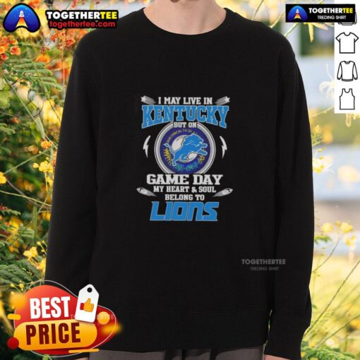Alt Text: Stylish sweatshirt reading 'I May Live In Kentucky, But My Heart Belongs To Detroit Lions' perfect for game day.